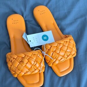 A New Day Vibrant Orange Braided Slides